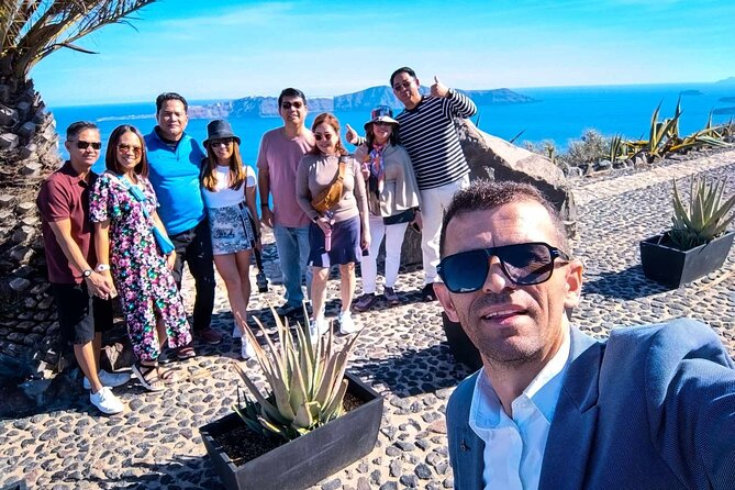Santorini Private Tour Blue Domes - Red Beach: red volcanic cliffs, turquoise water, and included time