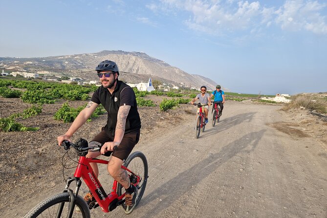 Santorini Small Group Guided E-bike Tour & Local Tomato Museum - The 3.5-hour route: tomato museum to caldera views