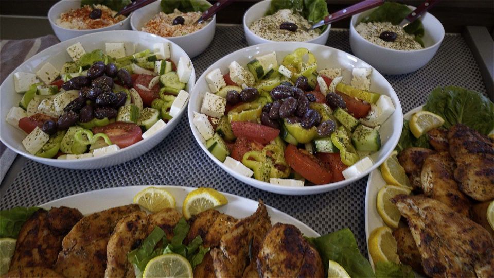 Santorini: Sunset Cruise with Greek Dinner and Transfer - Getting on the right boat: the hotel pickup that saves your time