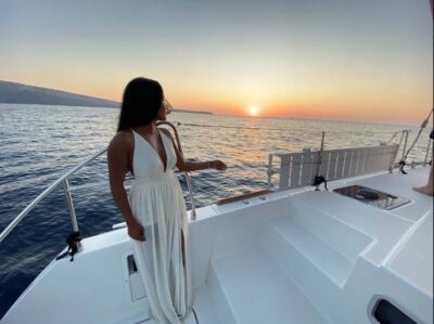 Santorini: Sunset Cruise with Greek Dinner and Transfer - The modern catamaran ride: caldera views without the hike