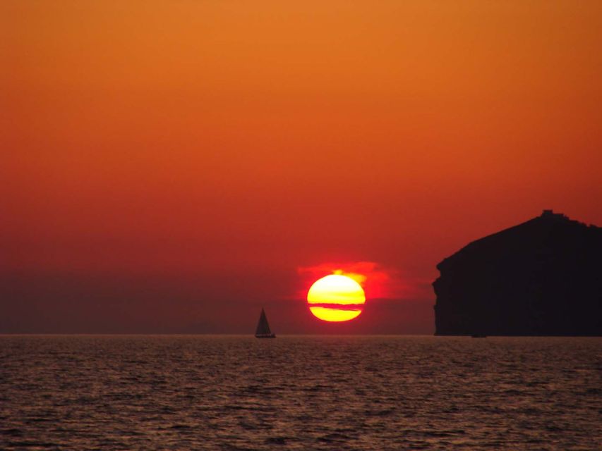 Santorini: Sunset Cruise with Greek Dinner and Transfer - Nea Kameni and Palea Kameni: warm-spring time near the volcano