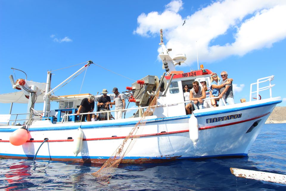 Santorini Sunset Fishing Trip with Dinner and Drinks - Traditional Music, Extra Fishing Time, and the On-Board Rhythm