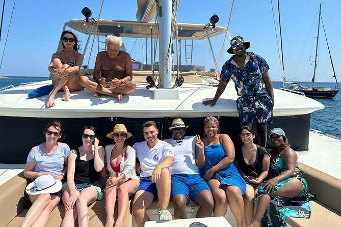 Santorini Sunset Sailing Cruise: Dinner, BBQ, Open Bar, Transfers - Sailing views: White Beach, Indian Rocks, and the Venetian Lighthouse