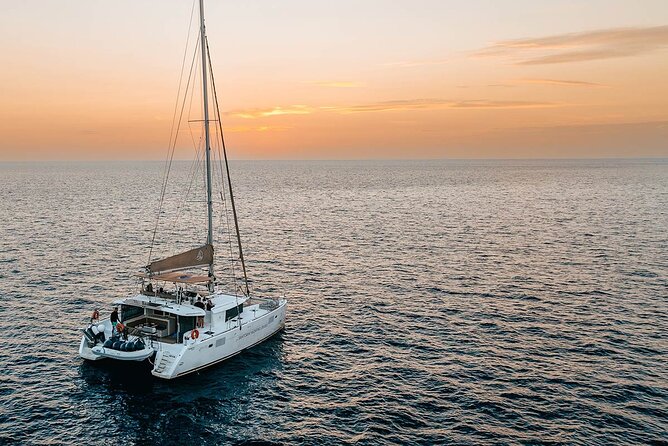 Santorini Sunset Sailing Cruise: Dinner, BBQ, Open Bar, Transfers - Mesa Pigadia swim plus Greek dinner, BBQ, and open bar