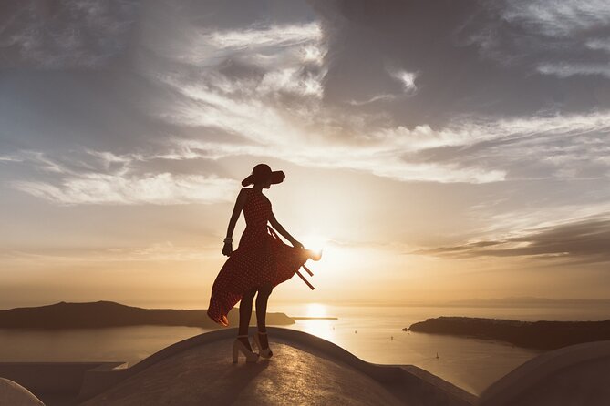 Santorini Sunset Walking Tour inc. tastings and 5 drinks - Fira alleys at sunset: souvlaki, wine, and a calmer view