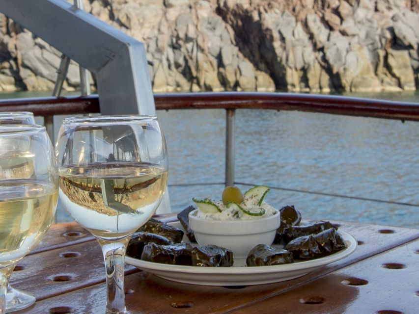 Santorini: Traditional Wooden Boat Tour with Meal and Wine - From Vlychada to the Caldera: the Wooden Boat Vibe