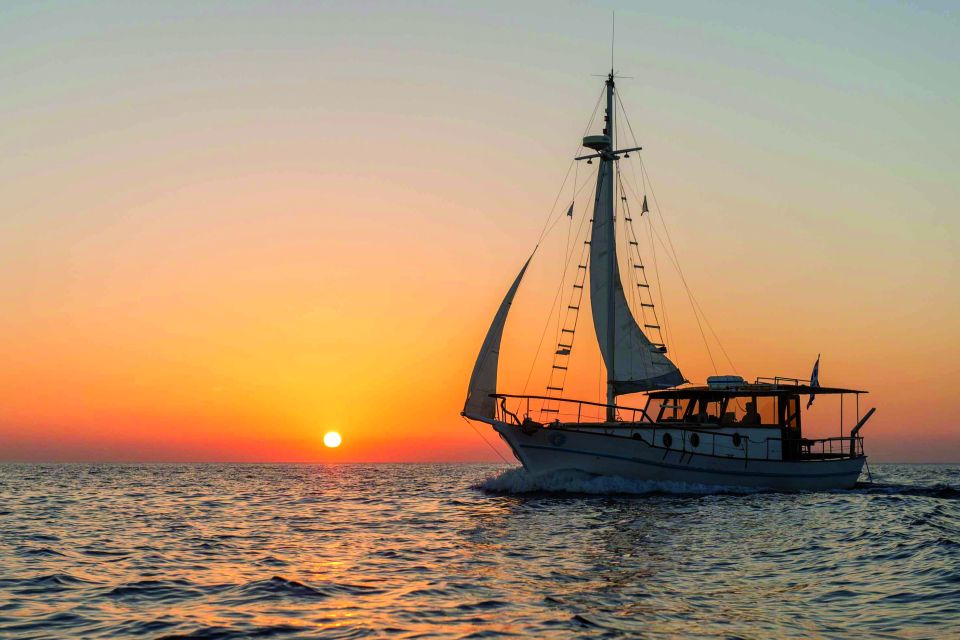 Santorini: Traditional Wooden Boat Tour with Meal and Wine - Thirassia Island: A Fishermen’s Side and Another Snorkel Session