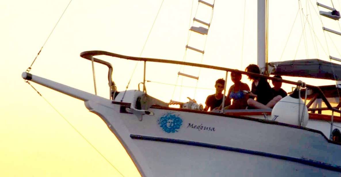 Santorini: Traditional Wooden Boat Tour with Meal and Wine - Ammoudi Harbour and the Agios Nikolaus Mention