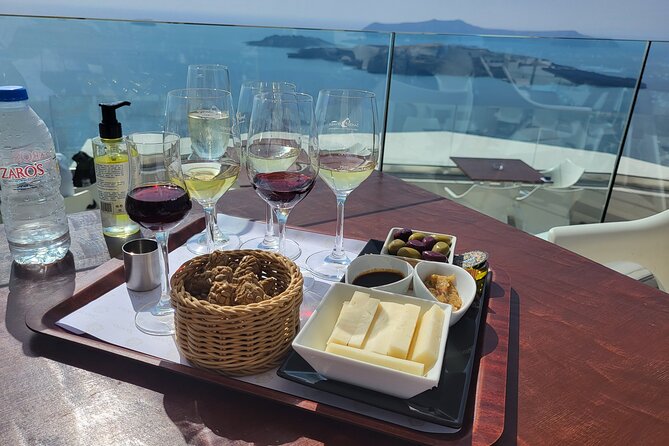 Santorini Unveiled. A Private Tour of Hidden Vistas and Wines - Koutsogiannopoulos Wine Museum tasting with cheese and olives