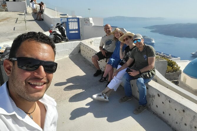 Santorini Unveiled. A Private Tour of Hidden Vistas and Wines - The Heart of Santorini rock window and Akrotiri Lighthouse at the southwest tip
