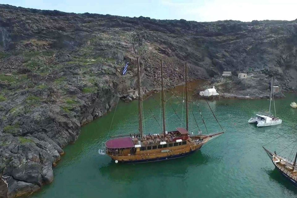 Santorini: Volcanic Sunset Cruise with Dinner - Volcanic Sunset on a Traditional Caique: How the 8 Hours Flow