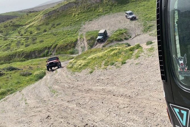 Santorini Wrangler Jeep Afternoon Convoy Tour - Entering the route: Pyrgos panoramas and Emporio windmills