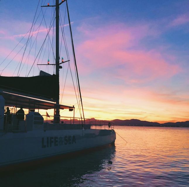 S'Arenal: Sunset Catamaran Cruise with BBQ - Drinks, music, and the relaxed party energy
