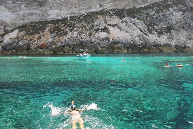 SciatumiaDay boat tour to Lampedusa with typical lunch - Sacramento Stack, Muro Vecchio, and Punta dell’Acqua: The Stops That Depend on the Day