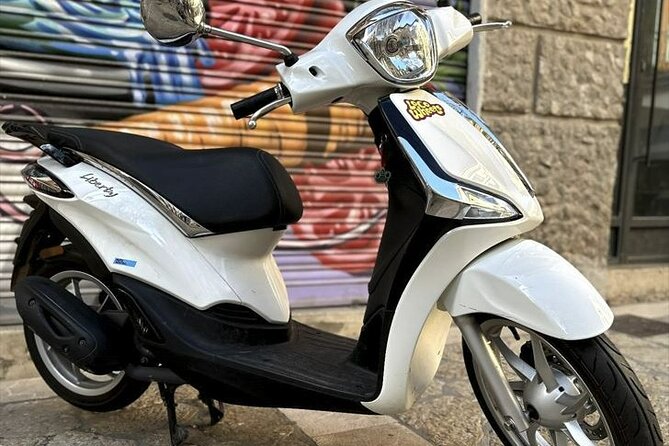 Scooter and Motorbike Rental to Explore Mallorca - Safety and Street Smarts: Helmets, Heavy Scooters, Parking