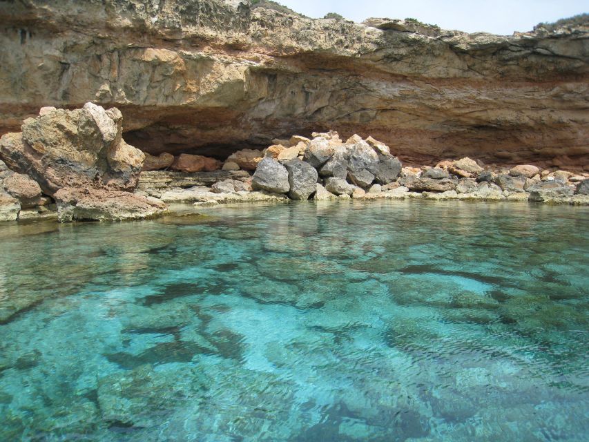 S'Espalmador and Formentera: Snorkeling Trip by RIB Boat - Stop 4: Cala Saona and the turquoise-red cliff contrast
