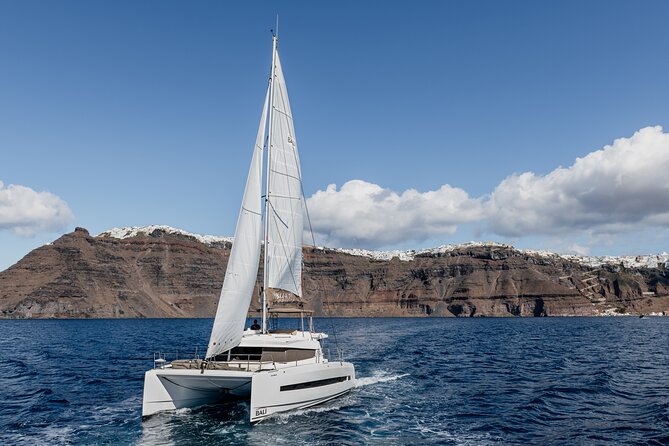 Shared Catamaran Half Day Cruise in Santorini - Onboard Food, Drinks, and Clean Bathrooms
