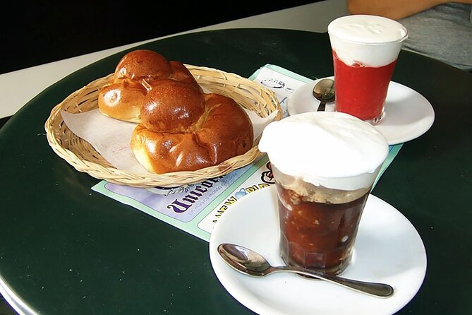Sicilian Street food tour: eat local in Messina - Stop 3: Campanile Bell Tower at Noon, Plus the Palazzo Zanca Courtyard