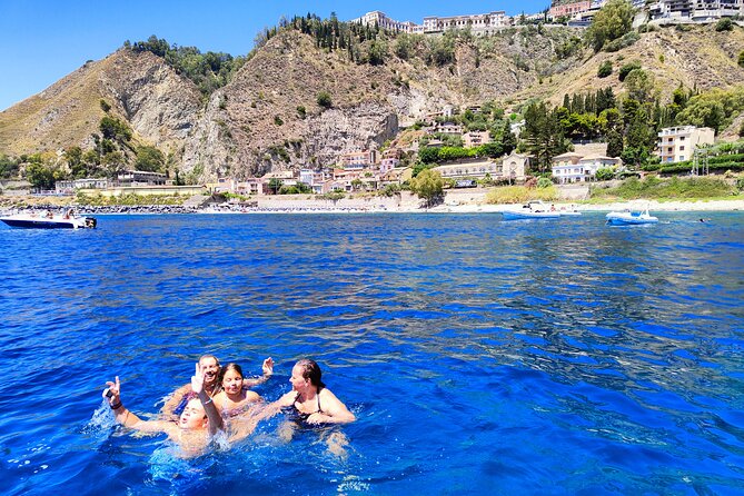 Sicilian wine tasting on the boat in Taormina - Baia delle Sirene: snorkeling-friendly water and a quieter vibe