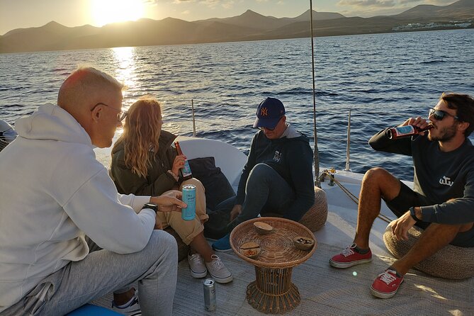 Small Group Dolphin Sunset Tour on Electric Catamaran Lanzarote - Comfort and Timing Tips: Dress Like the Wind Will Try You