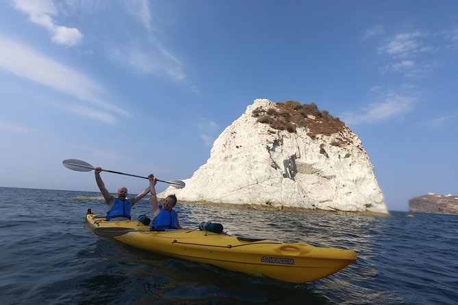 Small-Group Santorini Sea Caves Kayak Trip with Snorkeling & Picnic - Sea Caves and the Blue Light Moment