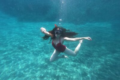 Small-Group Santorini Sea Caves Kayak Trip with Snorkeling & Picnic - White Beach and Cliff Jumping: The Adrenaline Stop