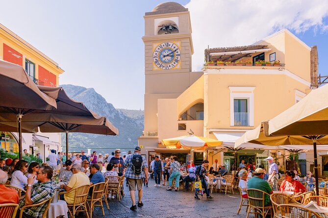Small Group Tour to Blue Grotto, Anacapri and Capri - Capri town time at La Piazzetta: shopping, cafes, and people-watching