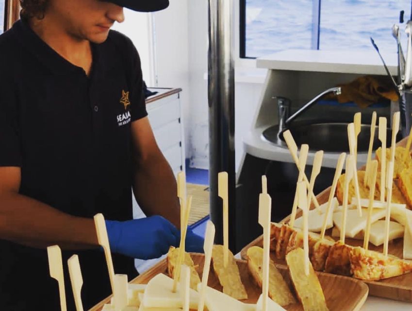 Southeast Fuerteventura: Boat Cruise with Lunch and Drinks - Lunch on board: tapas, paella, and unlimited drinks done right