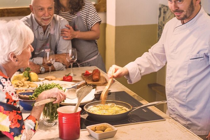 Spanish Cooking Experience in Mallorca - Open bar, bottled water, and the meal you actually eat