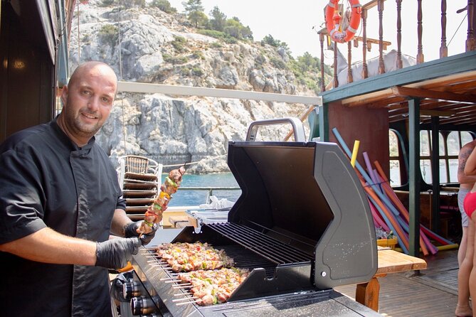Sun & Sea 6 Hour All Inclusive Swimming Cruise with Greek BBQ & Unlimited Drinks - Kallithea Springs: a quieter bay for easier floating