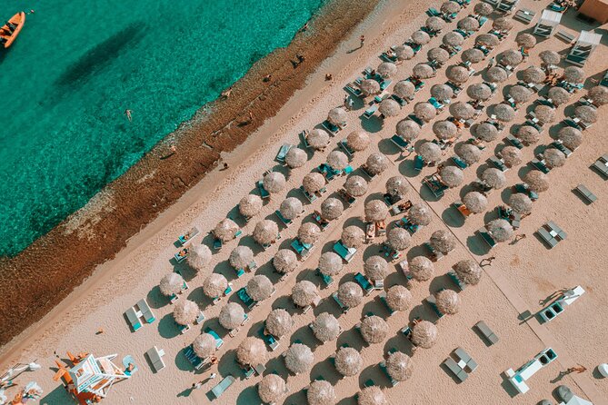 Super Paradise Beach Mykonos Seaside Sunbed (3rd & 4th row) - Super Paradise sunbeds: 3rd and 4th row value on a famous beach