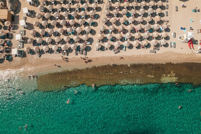 Super Paradise Beach Mykonos Seaside Sunbed (3rd & 4th row) - Timing rules: the 12:00 noon cutoff matters