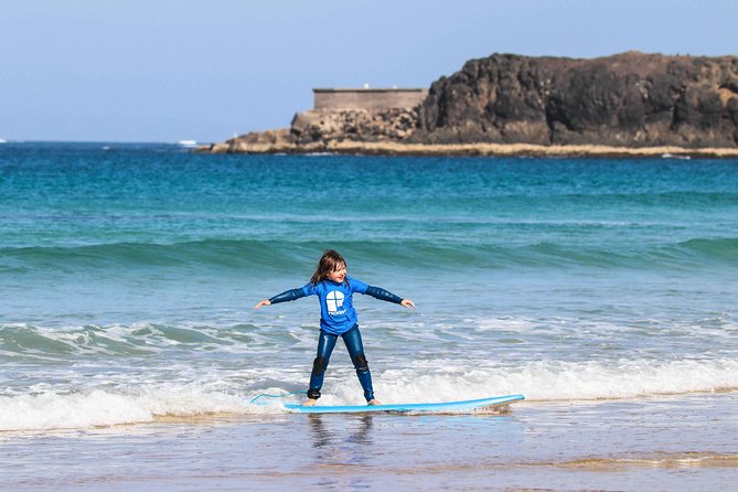 Surf Class at Corralejo - How they choose your waves: beginner to advanced, matched to conditions
