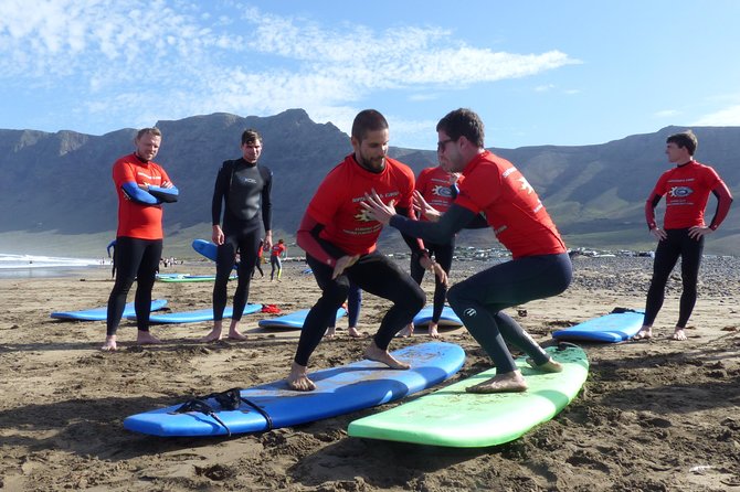 Surf class in Famara 9:15-12:00 or 11:45-14:30 (2h class) - Into the water: practicing fast, with instructors watching your form