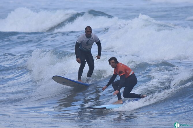 Surf class in Famara 9:15-12:00 or 11:45-14:30 (2h class) - Pick your time slot: 9:15–12:00 or 11:45–14:30