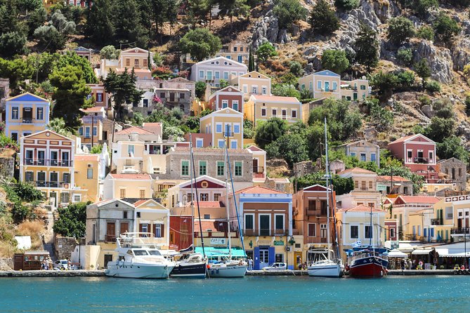 Symi Island from Rhodes with transfers from Ialysos and Ixia - Passing St George Bay and the Seasonal Swim Moment