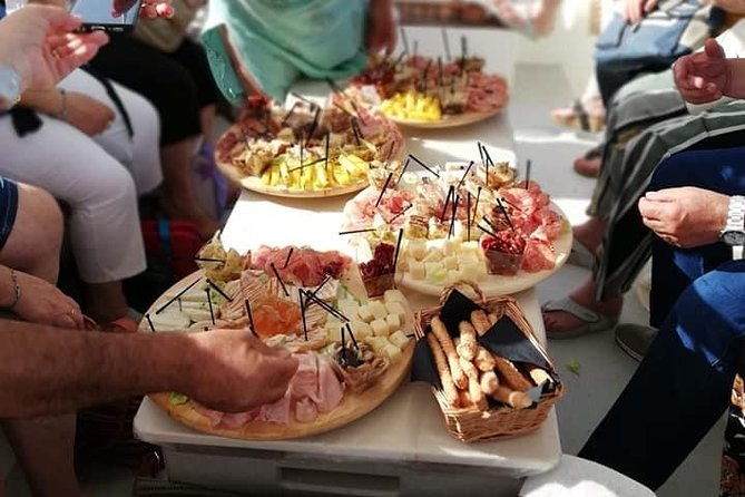 Syracuse Aperitif boat at Sunset island and sea caves - Getting out of Ortigia: Capuchin cove and the first cave stop