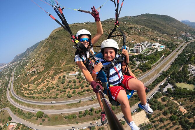 Tandem Paragliding Flight in Cefalù - Over Spiaggia Torre Conca, Spiaggia Salinelle, and Rocca di Cefalù