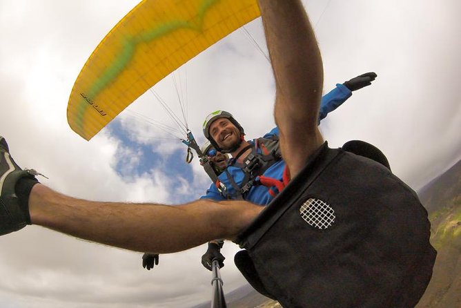 Tandem Paragliding Flight in South Tenerife - The views you actually come for: mountains, coast, and ocean passes
