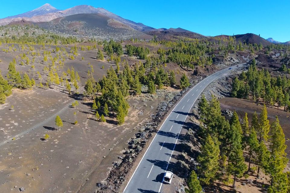Tenerife: Mount Teide Quad Tour in Tenerife National Park - Included perks: helmets, water, snacks, warm clothing, and insurance