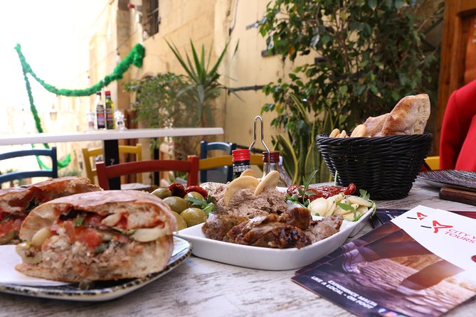 The Valletta Food Tour Experience, a private tour - What you eat: pastizzi, ftira, local platter, kinnie, and a sweet finish