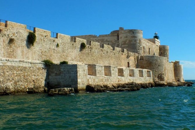 Tour of the island of Ortigia and exploration of sea caves with baths. - Key moments that make this Ortigia boat tour worth your time