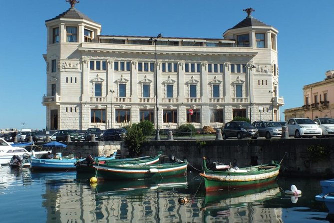 Tour of the island of Ortigia and exploration of sea caves with baths. - The swim-and-baths moment: how the “jump in” part works