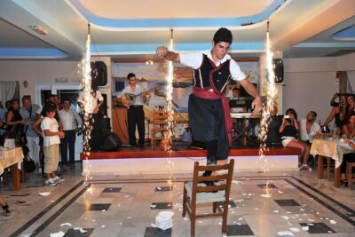 Traditional Greek Night live Music & Dinner Show in Santorini - Live Music and Folk Dance: Sirtaki, Zorba, Fire, and the Crowd Moments