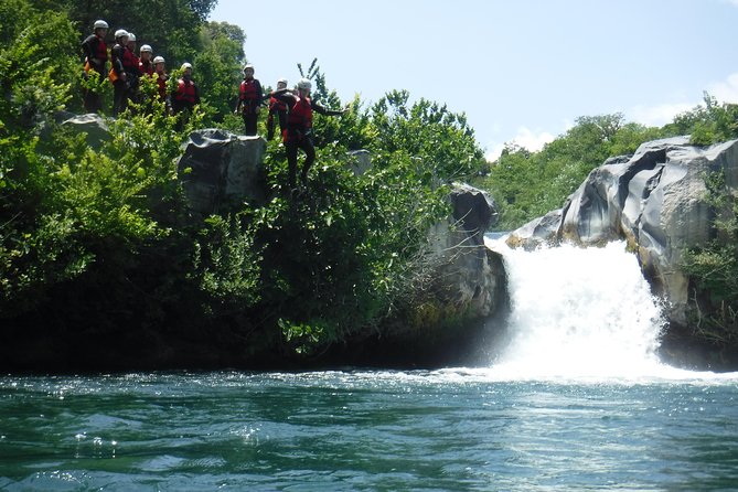 TuffAlcantara - dives, slides and lots of fun in the Alcantara river - Guides make the difference: safety briefings, harness routines, and fun energy