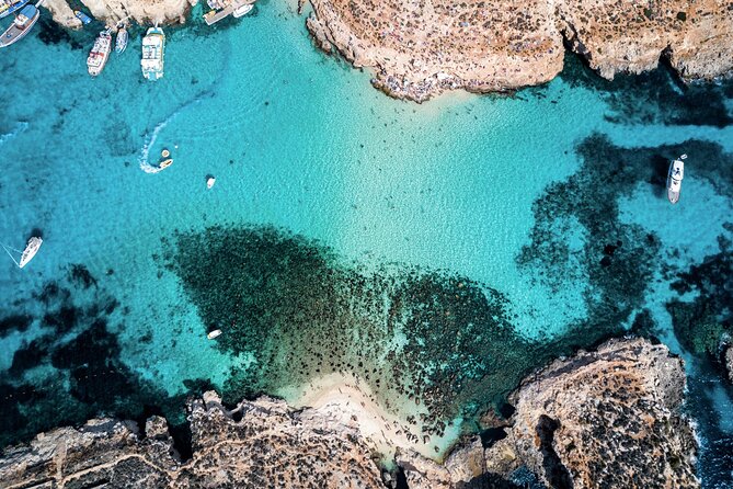Turkish Gullet Cruise to Gozo and Comino with Lunch and Transfers - Crystal Lagoon and Comino Caves: the optional €15 speedboat reality