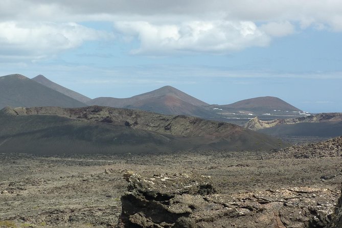 Volcano Hike - Timanfaya eruptions - Los Volcanes Natural Park: craters, cones, and living on lava