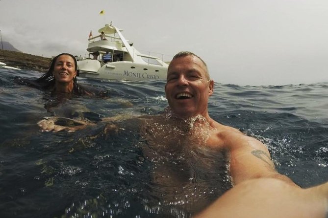 Whale Watching Catamaran Cruise with Transfer, Buffet by MC - The swim and snorkel stop: gear provided, time to actually enjoy the water