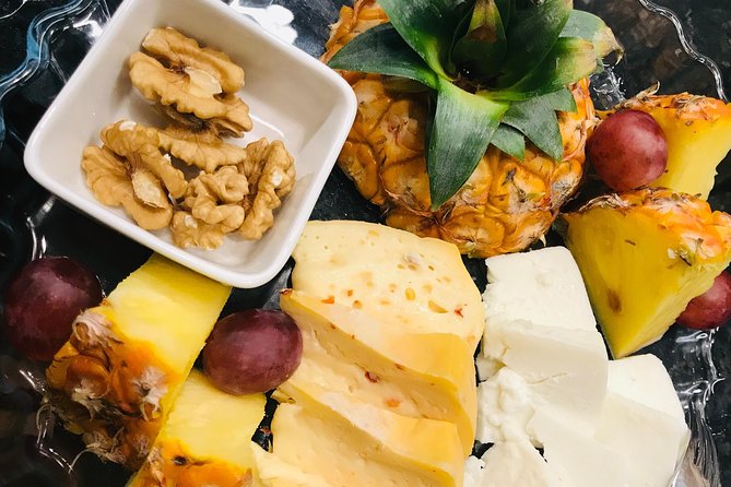 Wine & Food Evening Walking Tour in Ponta Delgada, incl. dinner - Comur food shops: snacks, walking, and the island way of eating