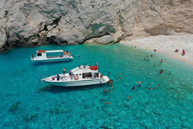 Zakynthos boat tour:Shipwreck& Local blue caves with 3 Swim Stops - Captain and Crew Handling: Friendly Service and Smooth Cave Navigation